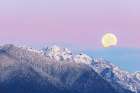 Washington State Moon setting over the Olympic Mountains at sunrise Art Print